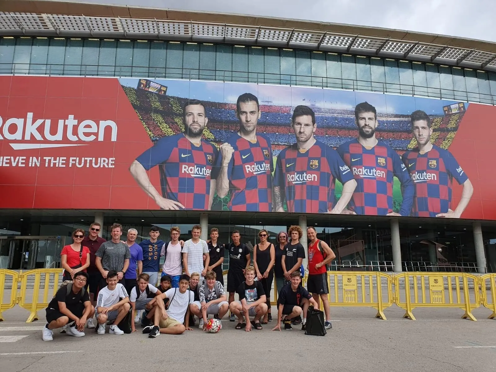 A Soccer Experience touring squad photographed outside Camp Nou in Barcelona