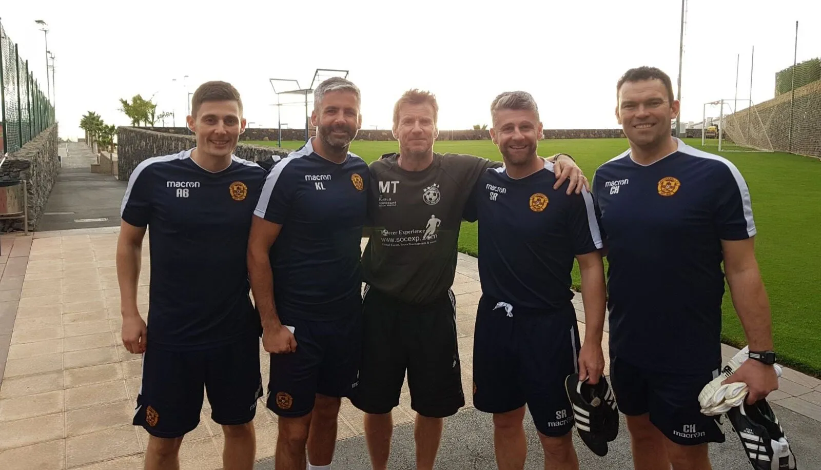 Five Motherwell F.C. coaching staff at the training ground during a winter camp in Spain