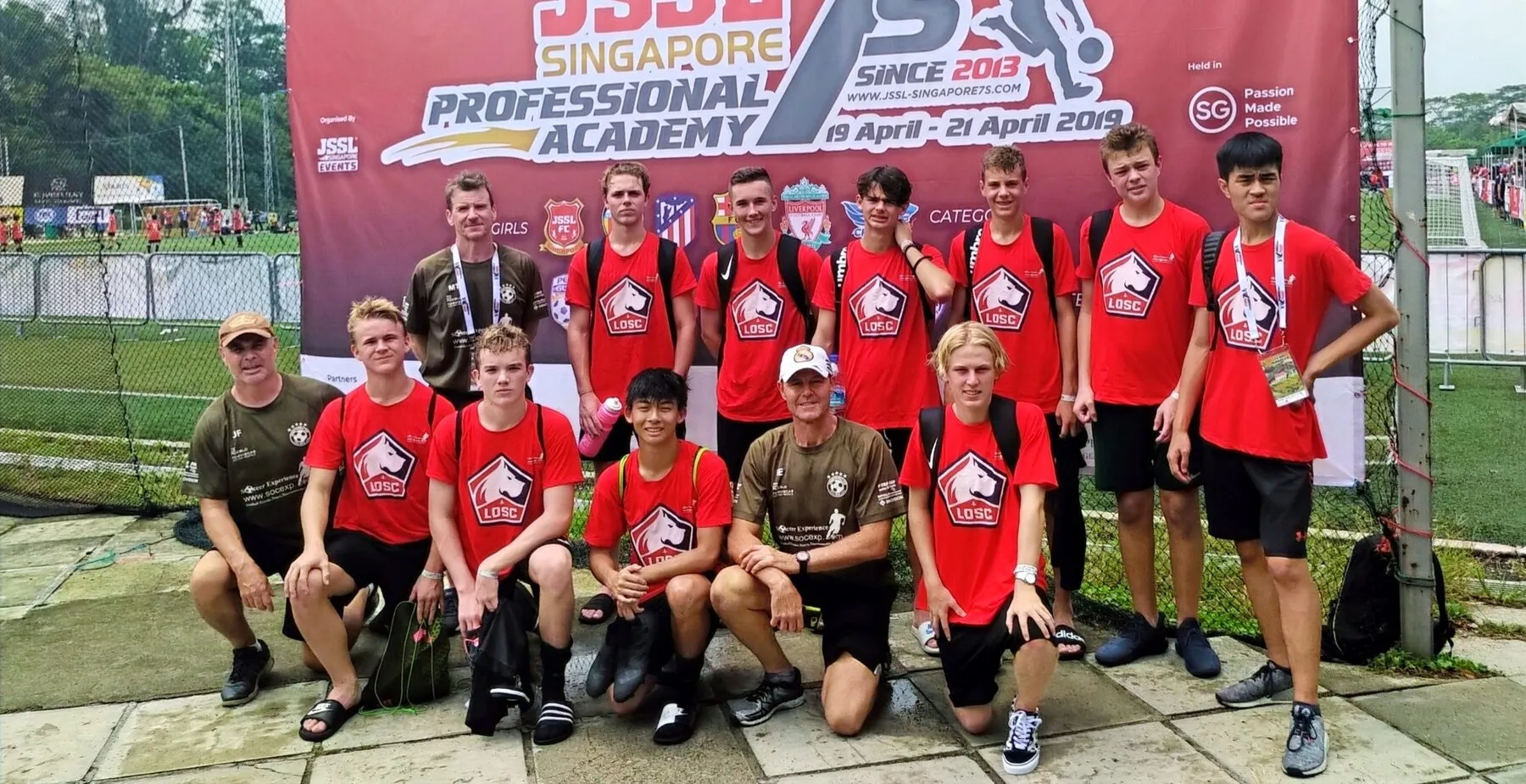 An elite youth squad in red kit at the JSSL Singapore professional academy sevens tournament