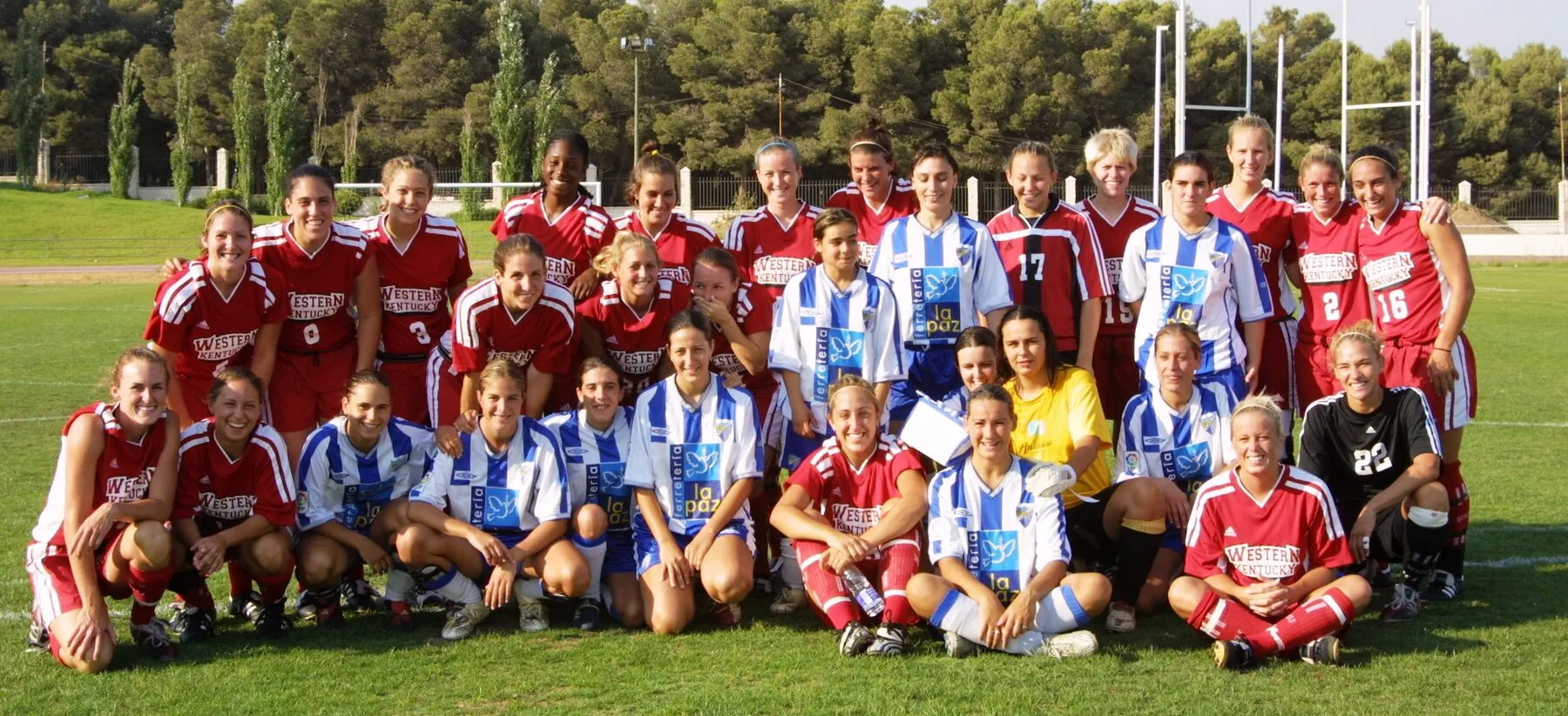 Two women’s college teams photographed together after a fixture on a Soccer Experience tour of Spain
